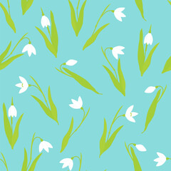 Vector seamless pattern. Snowdrop flowers on a blue background. Spring background.