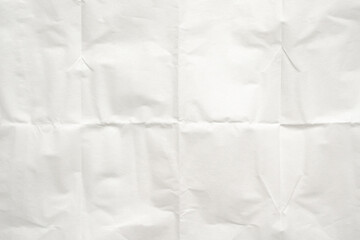 White folded and wrinkled paper texture background