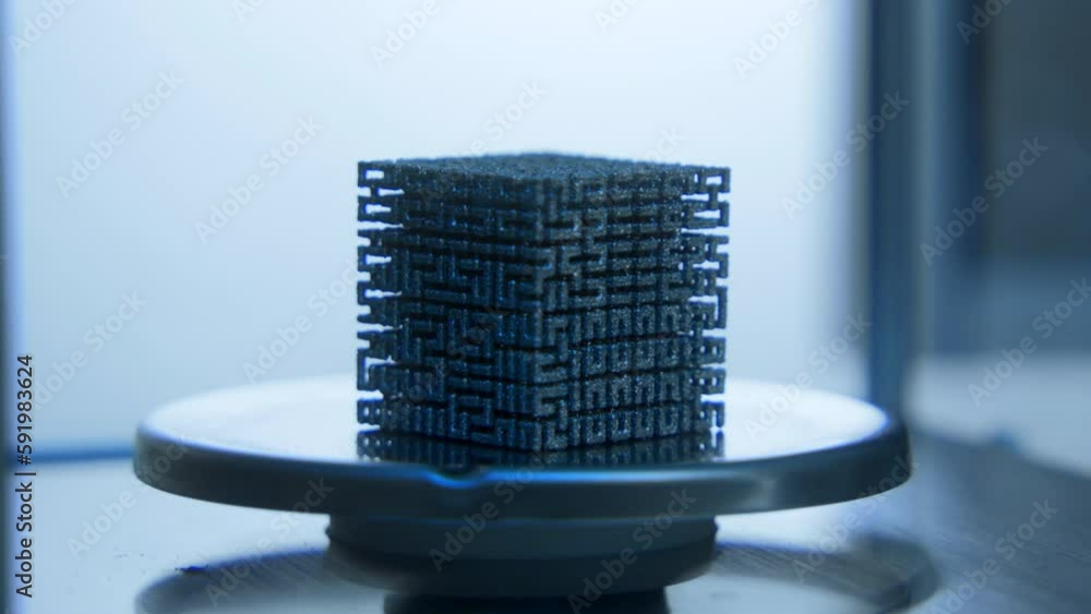 Poster close-up of cube in laboratory. stock footage. futuristic 3d cube lies in scientific laboratory. uni