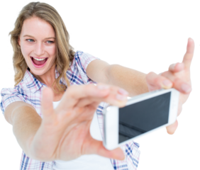 Pretty hipster taking selfie with smartphone