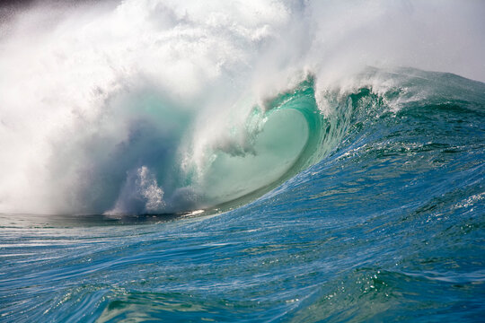 Large winter surf with waves breaking on the north shore of Oahu at Waimea on a big day; Oahu, Hawaii, United States of America