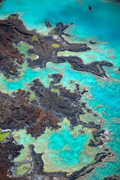 Interesting fingers of lava jutting into the ocean in Makena at the Ahihi-Kinau Natural Reserve in South Maui; Makena, Maui, Hawaii, United States of America