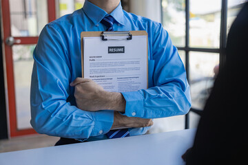 Send resumes to employers to review job applications. The concept presents the company's ability to...