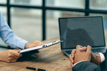 Send resumes to employers to review job applications. The concept presents the company's ability to...