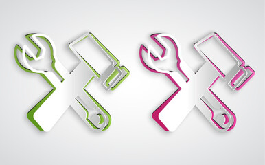 Paper cut Crossed hammer and wrench spanner icon isolated on grey background. Hardware tools. Paper art style. Vector