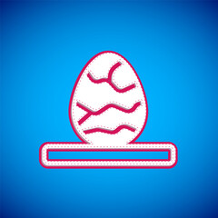 White Chinese tea egg icon isolated on blue background. Vector