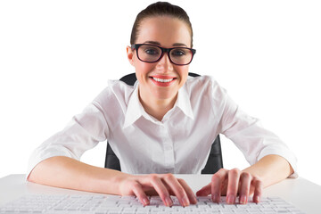 Businesswoman typing on a keyboard
