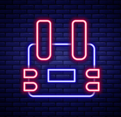 Glowing neon line Bulletproof vest for protection from bullets icon isolated on brick wall background. Body armor sign. Military clothing. Colorful outline concept. Vector