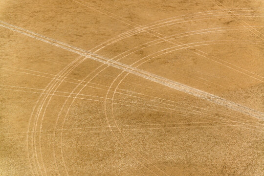 Car tire tracks on a salt pan; Wyndham, Western Australia, Australia