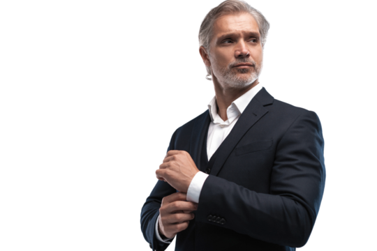 Handsome middle-aged man in suit posing against transparent background with copy space