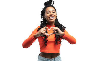 Young lovable woman with african hairstyle showing heart and laughing during indoor photoshoot. Graceful cute girl in casual clothes enjoying leisure time on transparent background