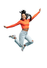 Excited happy pretty girl in casual jeans clothes high jump with raised hands and legs, on...