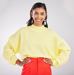 Happy woman, portrait smile and confidence standing isolated with hands on hips against a gray...