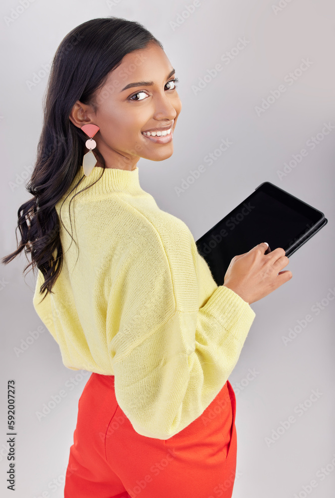 Wall mural Happy, portrait and a woman with a tablet for an email, communication and the internet. White background, isolated and an Indian girl with technology for social media, business app and the web