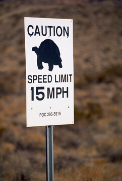 15 mph speed limit sign with a turtle silhouette in Snow Canyon State Park, Utah, USA; Utah, United States of America
