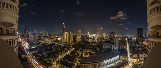 Fototapeta premium View over the skyline of Bangkok from aerial position at night