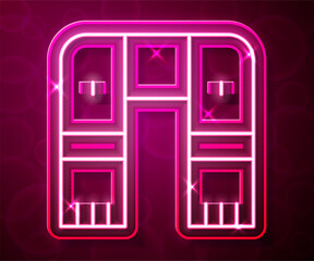 Glowing neon line Winter scarf icon isolated on red background. Vector