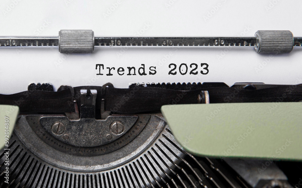 Poster text trends 2023 typed on retro typewriter