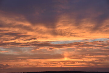 Red blue pink evening sky in summer. Beautiful sunset in the evening. Gradient sky.