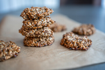 Vegan cookies made of banana and different seeds, photographed with natural light