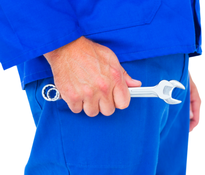 Mechanic holding spanners on white background