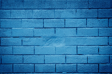 Classic blue brick wall texture close up.