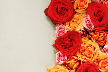 Floral background with red roses, copy space.