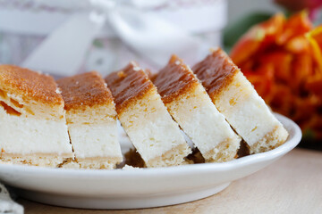 Traditional cheesecake on the table.