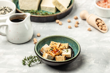 Asian tofu meal with soy sauce topping, Food recipe background. Close up
