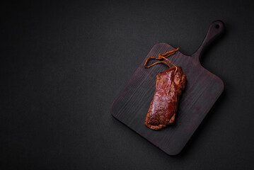 Delicious duck fillet or breast grilled or smoked with spices and salt