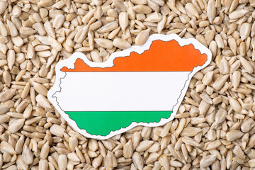 Flag and map of Hungary on sunflower seeds. Origin of grain, growing sunflowers in Hungary concept