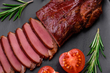 Delicious duck fillet or breast grilled or smoked with spices and salt