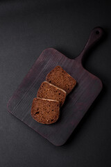 Loaf of fresh crispy brown bread with grains and seeds
