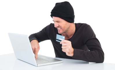 Hacker using laptop to steal identity