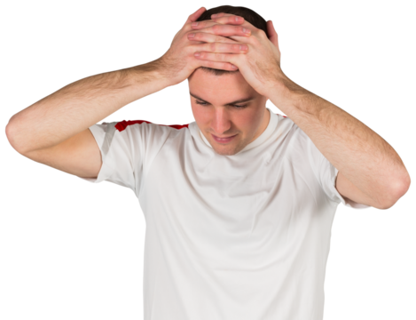 Disappointed football player looking down - Powered by Adobe