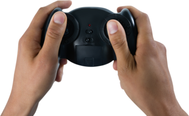 Cropped image of man holding controller