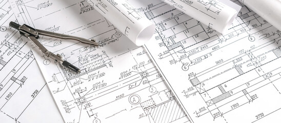 Architects concept, engineer architect designer freelance work on start-up project drawing, construction plan architect design working drawing sketch plans blueprints and making construction model