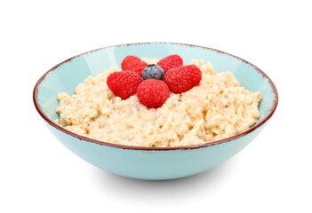 Bowl with tasty oatmeal, raspberries and blueberry isolated on white background