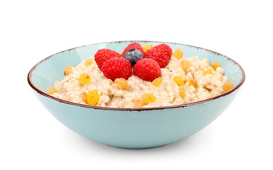 Bowl with tasty oatmeal, raisins, raspberries and blueberry isolated on white background