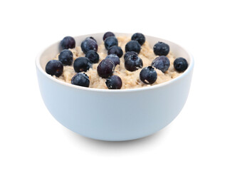 Bowl with tasty oatmeal and blueberries isolated on white background