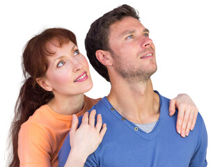 Happy couple looking upwards