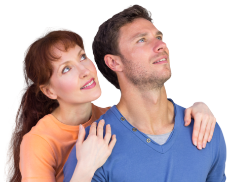 Happy couple looking upwards