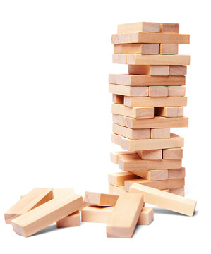 Tower of wooden blocks isolated with shadow. Concept of destruction, instability