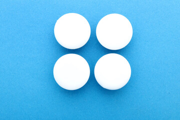 Blank white badges on blue background