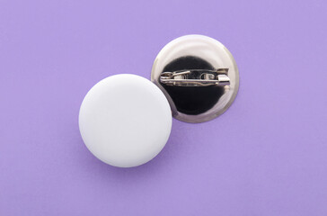 Blank white badges on lilac background