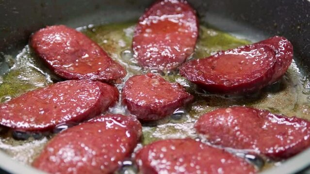 Turkish-style fried sausage is a popular Turkish dish made by frying slices of sucuk (a type of spicy sausage) in oil until crispy and golden brown.