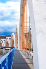 Details of modern railroad bridge over the river in Poland. Path for staff of railway.