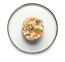 Plate of tasty Olivier salad on white background