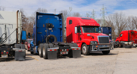 trucks and trucking as symbols of commerce, industry, and mobility. They transport goods across vast distances, fueling the economy and connecting communities.
