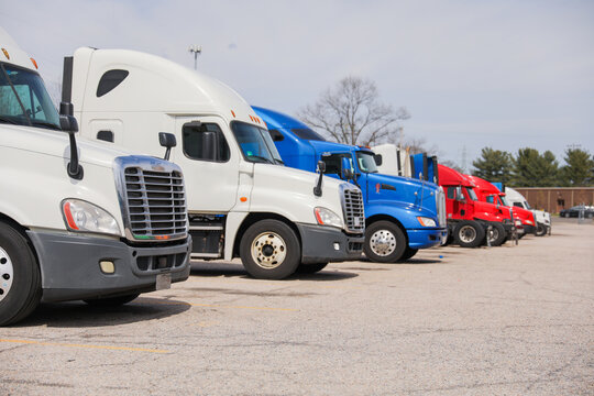 trucks and trucking as symbols of commerce, industry, and mobility. They transport goods across vast distances, fueling the economy and connecting communities.